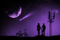 Silhouette couple man and woman holding hand moon night watching a meteor Royalty Free Stock Photo