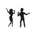 Silhouette of a couple man and woman singing