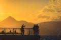 Silhouette of a couple posing at sunset. Royalty Free Stock Photo