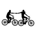 Silhouette of couple riding bikes vector illustration