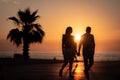 Silhouette of a couple at tropical sunset Royalty Free Stock Photo