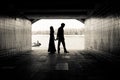 Silhouette of a couple in a tunnel Royalty Free Stock Photo