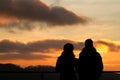 Silhouette of couple watching sunset Royalty Free Stock Photo