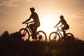 Silhouette of Couple of young man and woman cycling together along the road at sunset time, Generative Ai Royalty Free Stock Photo