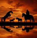 Silhouette cowboy with horses