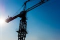 Silhouette crane with sky at construction site