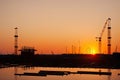 Silhouette Crane at Sunset on Construction Site. Generative Ai Royalty Free Stock Photo