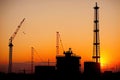 Silhouette Crane at Sunset on Construction Site. Generative Ai Royalty Free Stock Photo