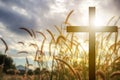 Silhouette cross in blue sky background