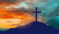 silhouette of cross on calvary hill over sky