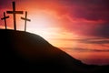 Silhouette cross on Calvary mountain sunset background. Easter concept Royalty Free Stock Photo