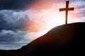 Silhouette cross on Calvary mountain sunset background. Easter concept Royalty Free Stock Photo