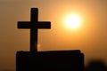 Silhouette of the cross on the holy bible, religion symbol in light and landscape over a sunrise, background, religious, faith Royalty Free Stock Photo