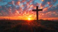 Silhouette of a cross with the rising sun painting the sky in vibrant hues. Easter morning. Wooden cross in a field at Royalty Free Stock Photo