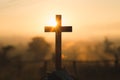 Silhouette of crucifix cross at sunset time with holy and light background Royalty Free Stock Photo