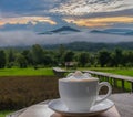 silhouette cup of latte coffee with viewpoint at the mountain in the Phu Pa por Fuji at Loei, Loei province, Thailand fuji mounta