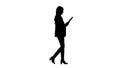 Silhouette Cute Arabian businesswoman using tablet computer whil