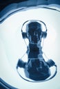 Silhouette of a cyber digital head in a headphones as a dj