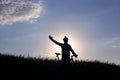 Silhouette of a cyclist with a bike in the sun Royalty Free Stock Photo