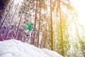 Mountain biking in snowy forest