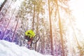 Mountain biking in snowy forest