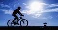 Silhouette of the cyclist riding a road bike
