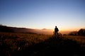 Silhouette of cyclist in sunset Royalty Free Stock Photo