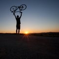 Silhouette of cyclist in sunset Royalty Free Stock Photo