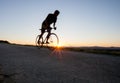 Silhouette of cyclist in sunset Royalty Free Stock Photo