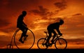 Silhouette cyclists on bicycles Royalty Free Stock Photo