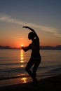 Silhouette of a dancer in the beach Royalty Free Stock Photo
