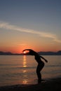 Silhouette of a dancer in the beach Royalty Free Stock Photo