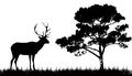 Silhouette of deer and tree