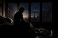 Silhouette depressed man sadly sitting in the bedroom. Sad asian man suffering depression insomnia awake. Generative by AI. Royalty Free Stock Photo