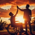 silhouette of disabled handicapped young man in wheelchair raised hands with his care helper in sunset