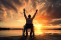 Silhouette of a disabled man in a wheelchair at sunset, Disabled handicapped man has a hope. He is sitting on wheelchair and Royalty Free Stock Photo