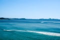 Silhouette of distant Surfer`s Paradise skyline along coast