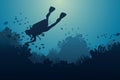 Silhouette of diver, coral reef and underwater