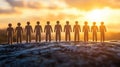 Silhouette Paper People Holding Hands Stand Against Beautiful Sunset Horizon Royalty Free Stock Photo