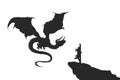 Silhouette of a dragon near the victim. The tied young girl became the monster's prey. Isolated fantasy scene