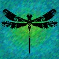 Silhouette of a dragonfly painted by blots.
