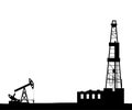 Silhouette of drilling rig and pump.