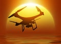 Silhouette of a drone with digital camera flying over the sun Royalty Free Stock Photo