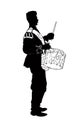 A silhouette of a drummer in a regimental orchestra Royalty Free Stock Photo