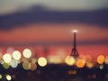 Silhouette of Eiffel tower and night lights of Paris, France