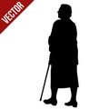 Silhouette of a elderly woman with cane