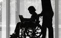 Silhouette elderly woman reading a book with her son take car Royalty Free Stock Photo