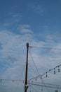 silhouette of electric pole against clear blue sky background. Royalty Free Stock Photo