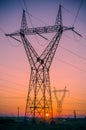 Silhouette electricity pylons