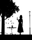 Silhouette elegant girl with cup of coffee, cafe table, autumn, tree, falling leaves, black color. Vector illustration Royalty Free Stock Photo